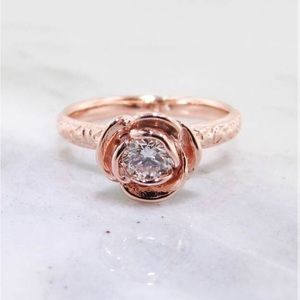 Custom designed diamond ring. 14k rose gold with 0.35ct with GIA certificate.